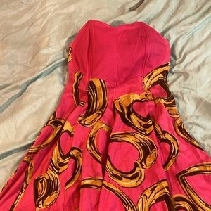 Strapless A-line short pink cocktail dress.